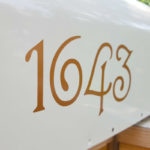 Guttenberg Mailbox numbers Copper on white